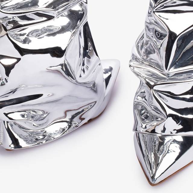 Le Silla Stivale al ginocchio d'ispirazione Western con risvolto metallizzato argento 2025