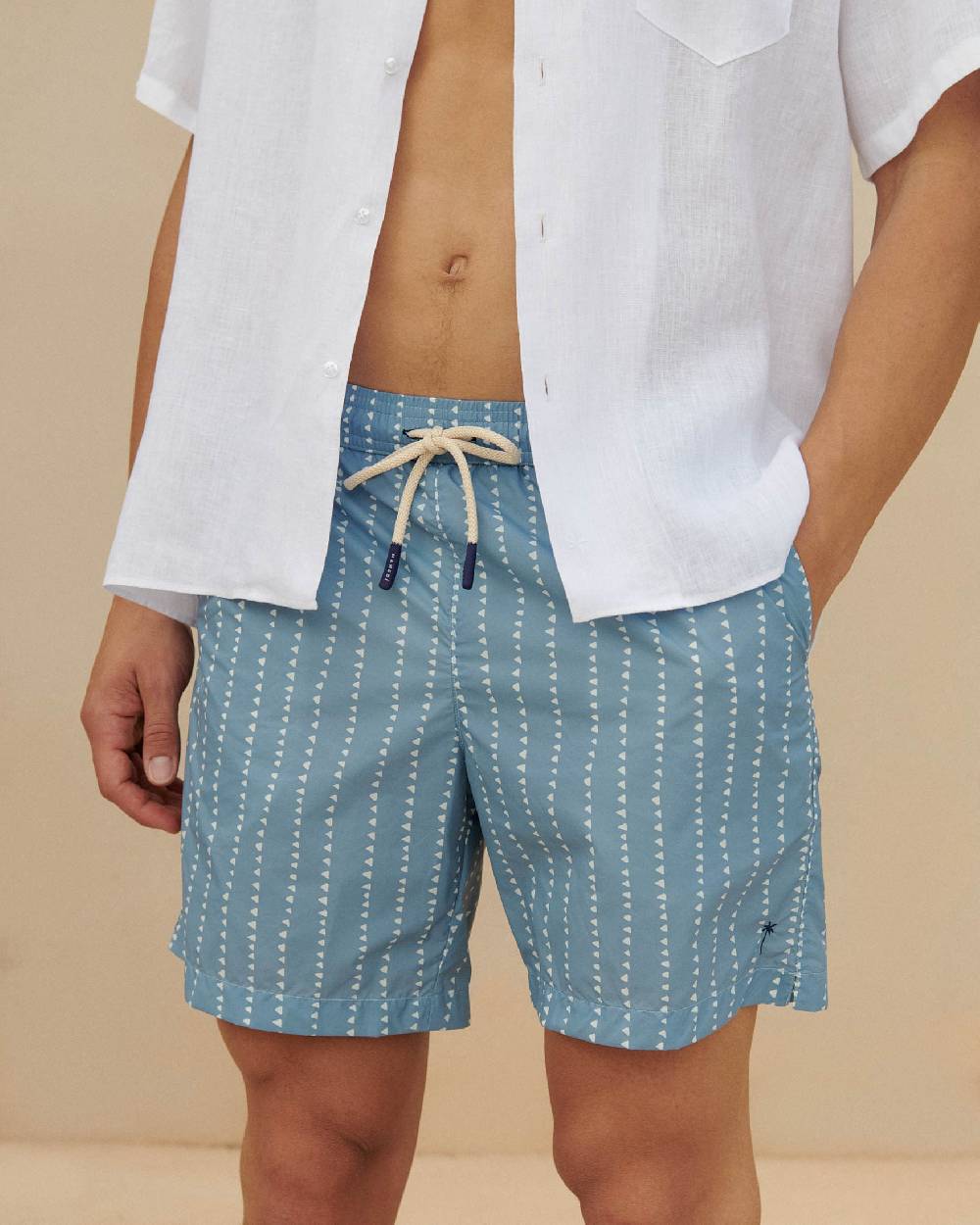 Manebí Printed Swim Shorts - Indigo with White Linear Triangles Qualità