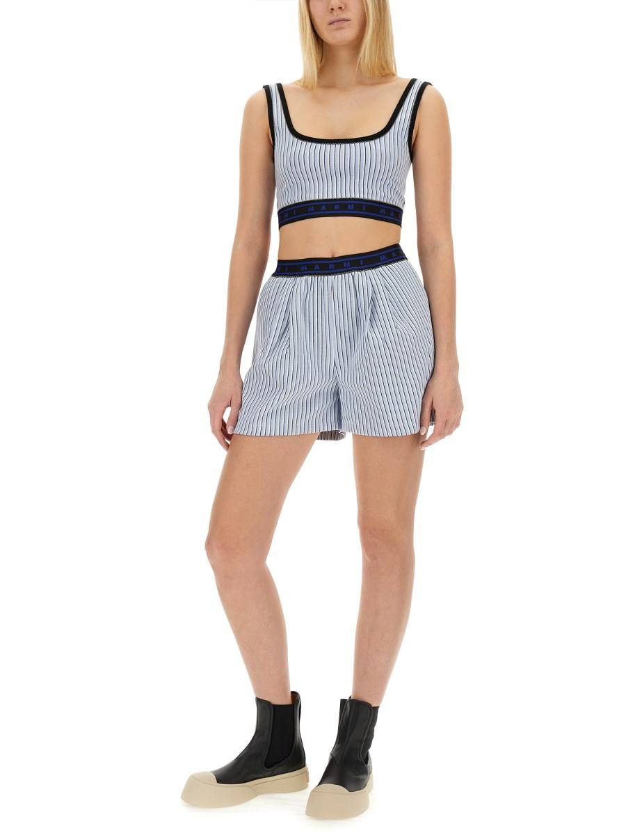 MARNI BERMUDA IN TESSUTO TECNICO CON MOTIVO RIGA Offerta