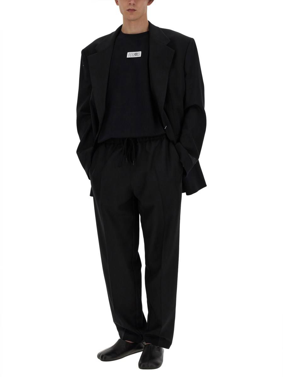 MM6 MAISON MARGIELA PANTALONE IN LANA CON GAMBA AFFUSOLATA Pezzi Unici
