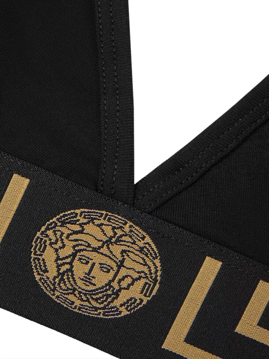 VERSACE TOP IN JERSEY CON GRECA 2025